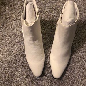 White faux snakeskin booties